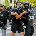 Se ridica sperantele in SUA pentru un compromis al reformei politiei, dar uriase obstacole politice apar